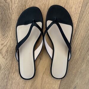 Stuart Weitzman Minimalist Black Leather Flip Flops